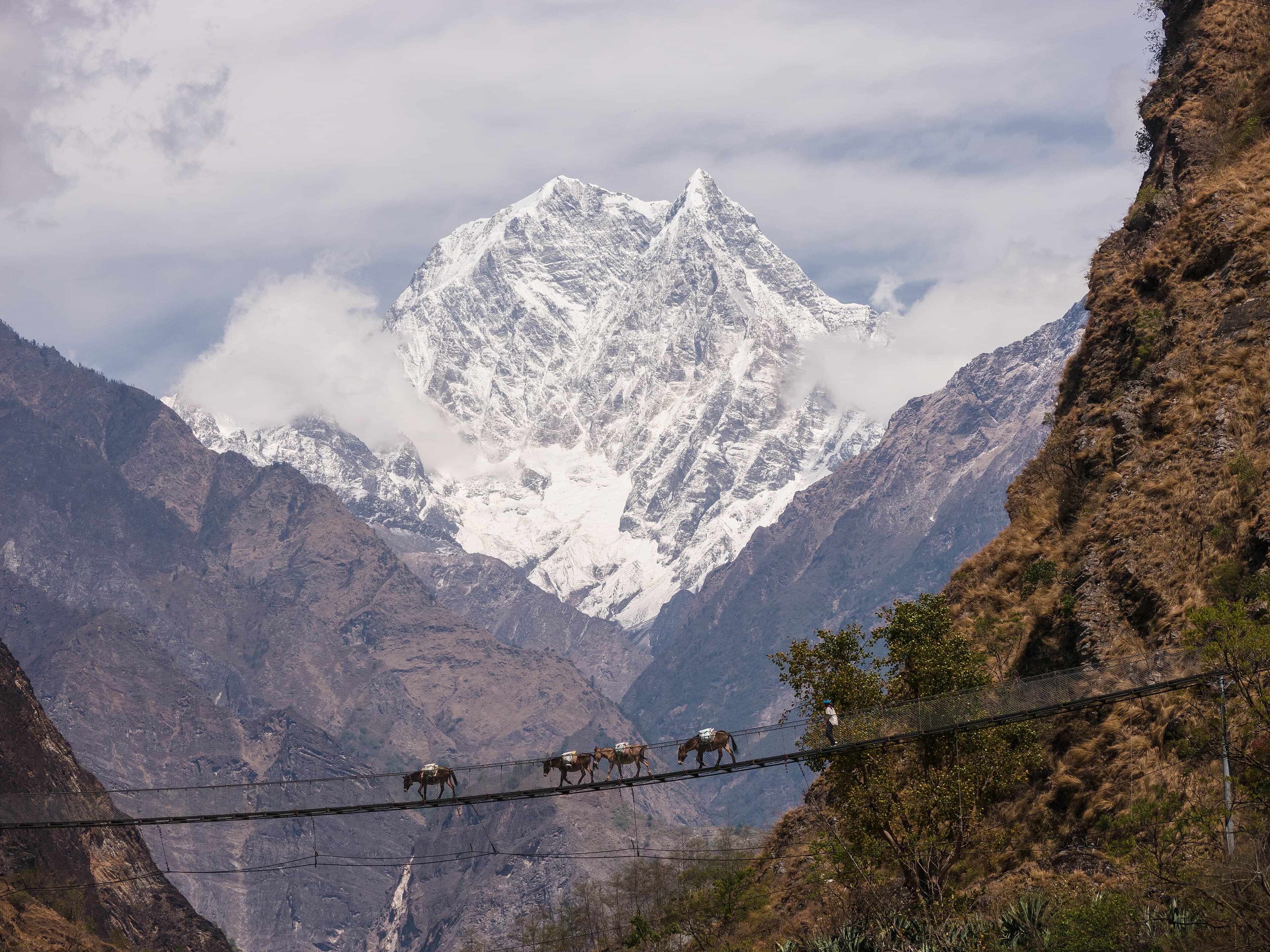 Nilgiri above a suspension bridge near Tatopani, on the road toward Narchyang
